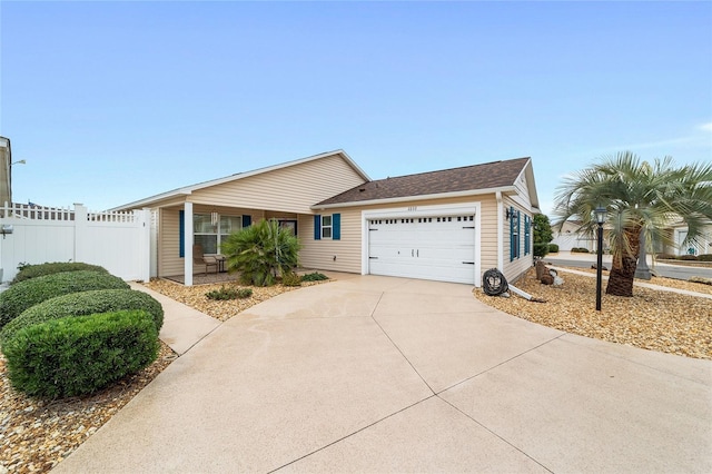 ranch-style home with a garage