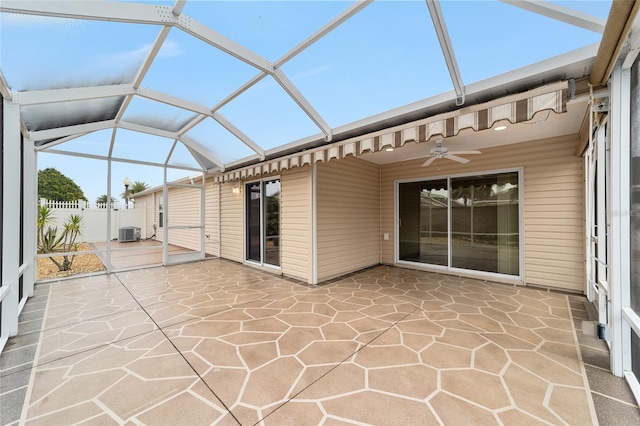 unfurnished sunroom featuring vaulted ceiling and ceiling fan