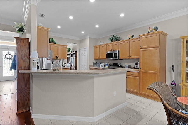 13914 SE 96th Cir, Summerfield, FL 34491 - kitchen featuring crown molding, appliances with stainless steel finishes, and light brown cabinets