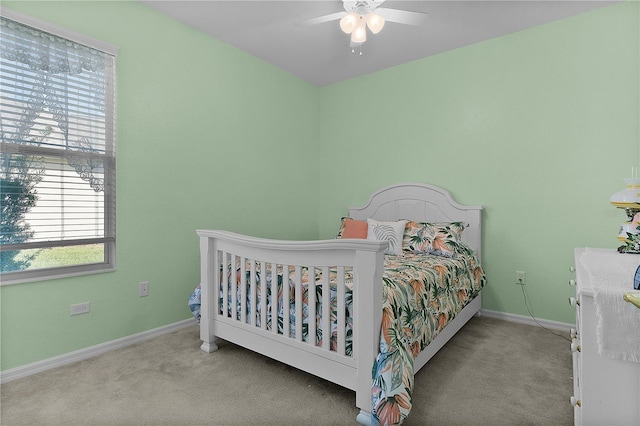 13914 SE 96th Cir, Summerfield, FL 34491 - bedroom with light colored carpet and ceiling fan