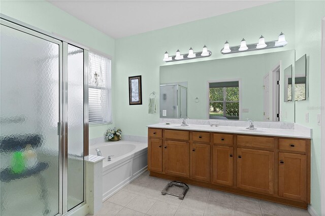 13914 SE 96th Cir, Summerfield, FL 34491 - bathroom featuring tile patterned flooring, plus walk in shower, and vanity