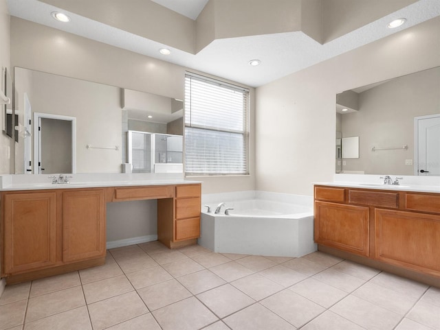 bathroom with vanity, independent shower and bath, and tile patterned flooring