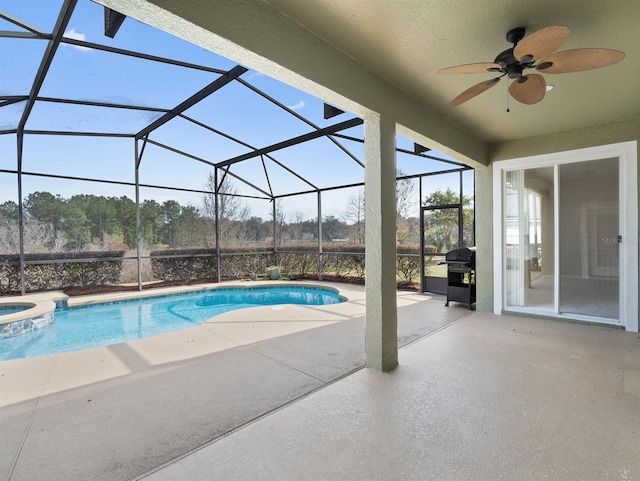 view of swimming pool with a lanai, grilling area, a patio, and ceiling fan