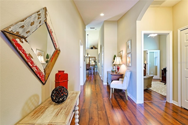 hallway featuring dark hardwood / wood-style flooring