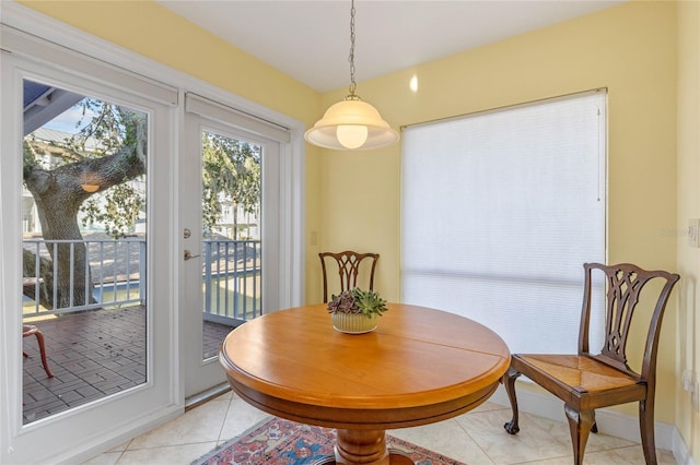 dining space with light tile patterned floors