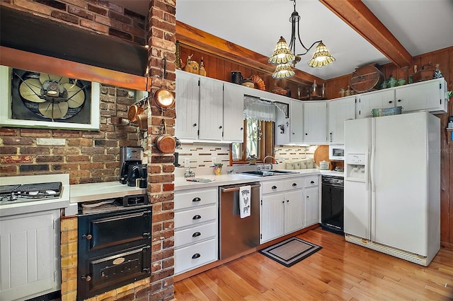 kitchen featuring sink, hanging light fixtures, stainless steel dishwasher, beam ceiling, and white refrigerator with ice dispenser