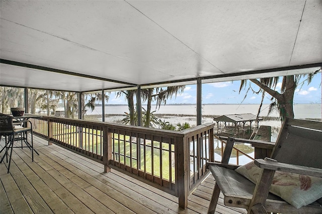 sunroom with a water view