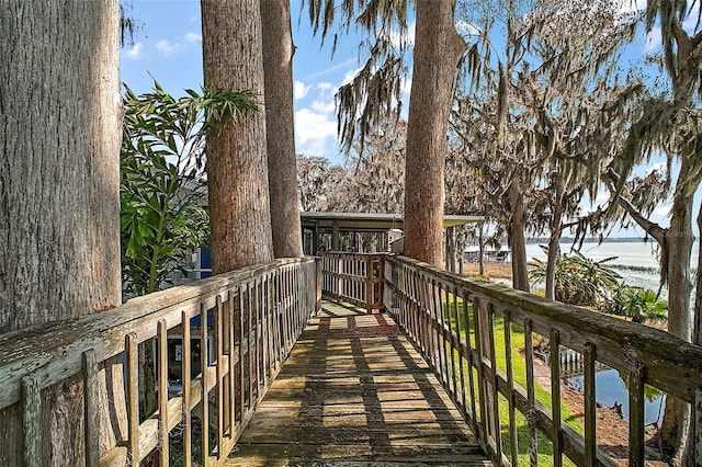 surrounding community with a water view