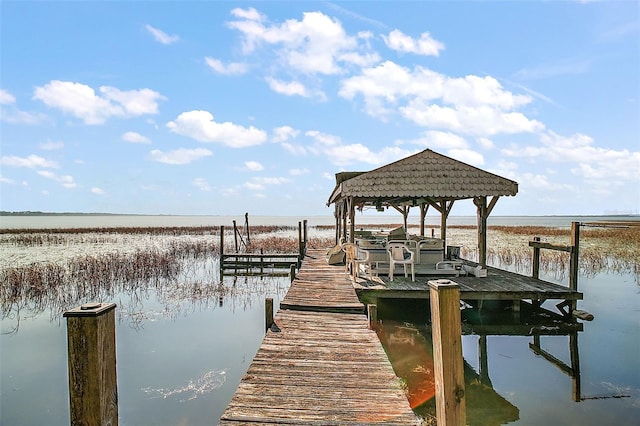 view of dock with a water view