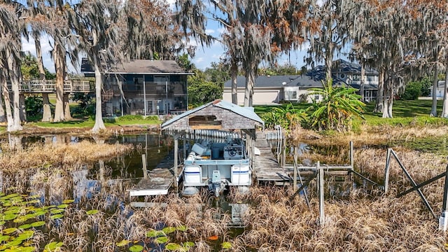 dock area featuring a water view