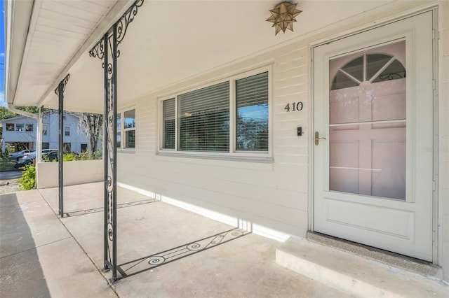 property entrance with a porch