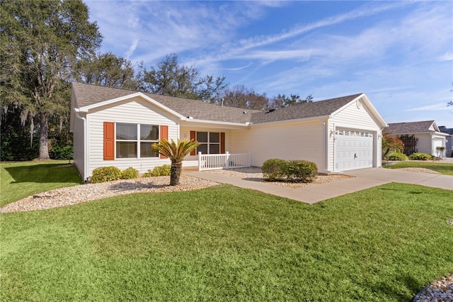 single story home featuring a garage and a front yard