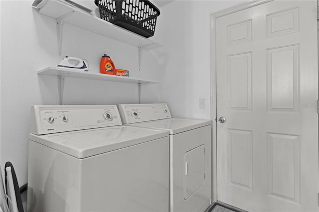 laundry area with washer and clothes dryer