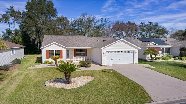 ranch-style house featuring a porch, a garage, and a front lawn