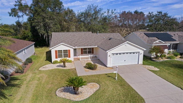 ranch-style home with a porch, a garage, and a front lawn