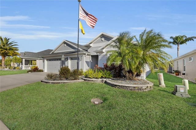 view of front facade featuring a garage and a front lawn