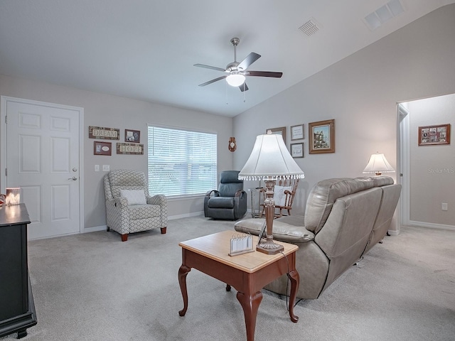 carpeted living room with vaulted ceiling and ceiling fan