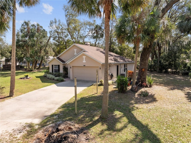 ranch-style house featuring a garage and a front yard