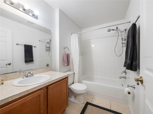 full bathroom featuring tile patterned flooring, vanity, shower / bath combination with curtain, a textured ceiling, and toilet