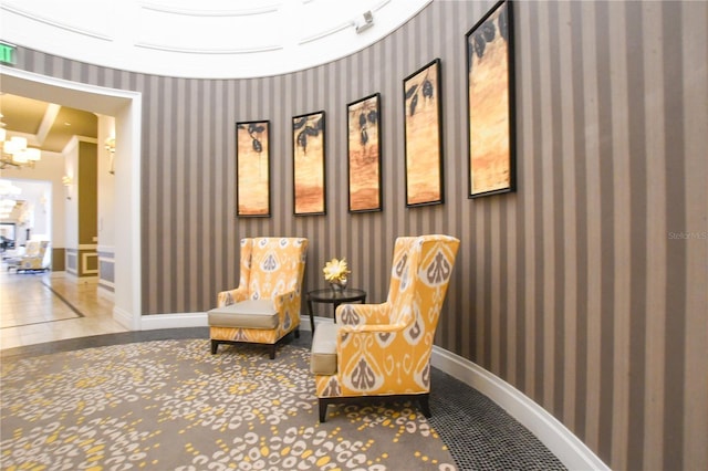 living area with an inviting chandelier