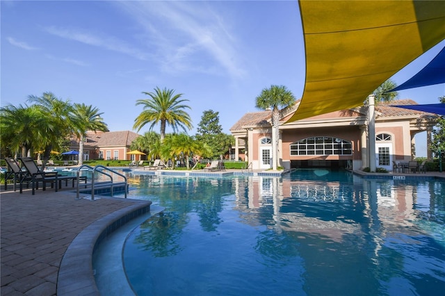 view of swimming pool featuring a patio