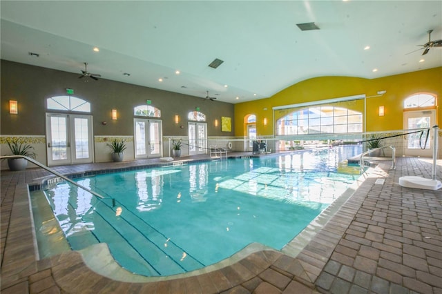 view of swimming pool featuring ceiling fan and french doors