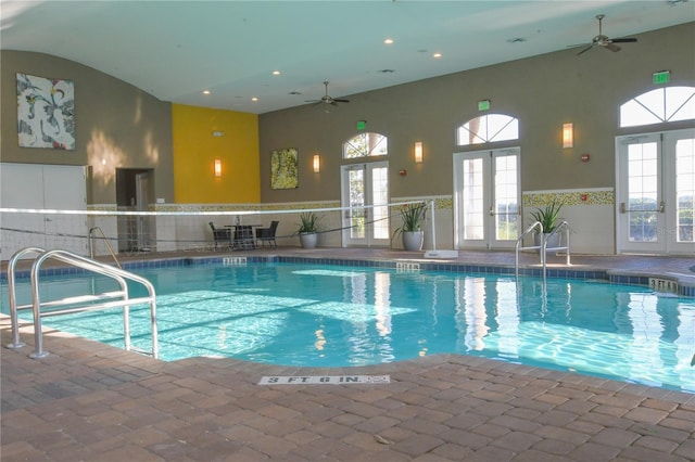 view of pool featuring ceiling fan and french doors