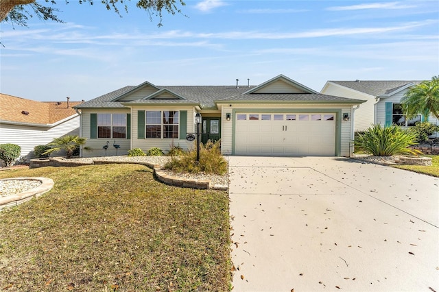 single story home with a garage and a front yard