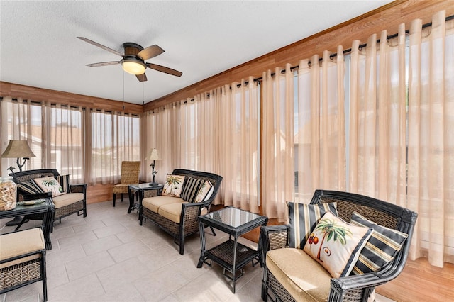 sunroom / solarium with ceiling fan