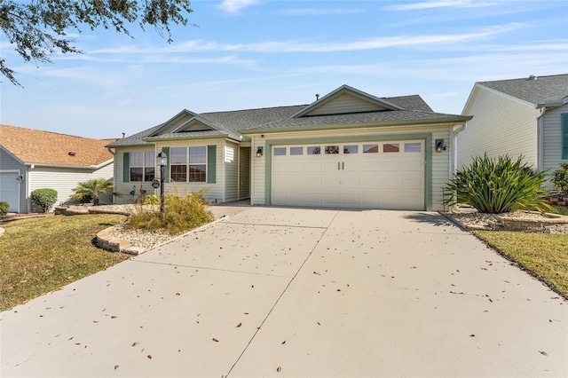 ranch-style house featuring a garage