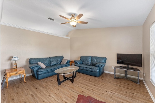 living room featuring vaulted ceiling, ceiling fan, and light hardwood / wood-style floors