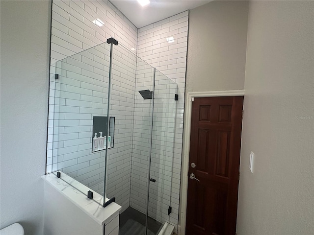 bathroom with an enclosed shower