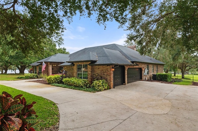 view of property exterior featuring a garage