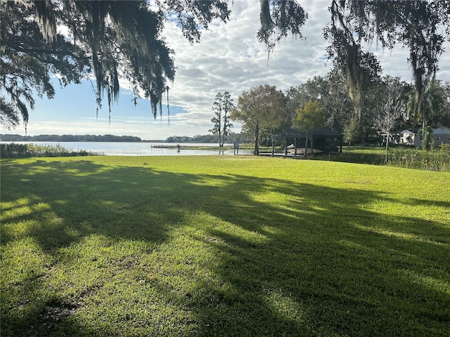 view of yard with a water view