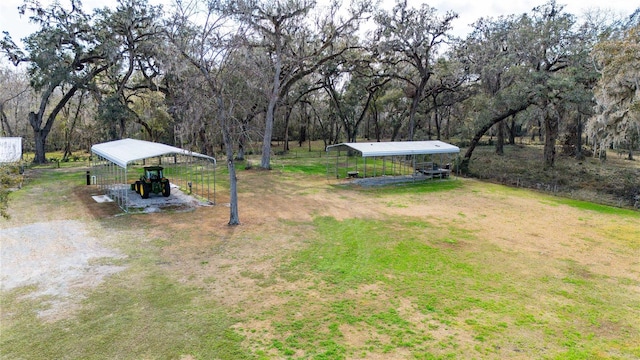 view of yard with a carport