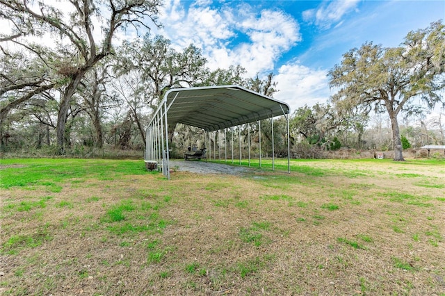 view of yard with a carport