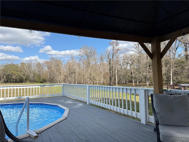 exterior space featuring a wooden deck