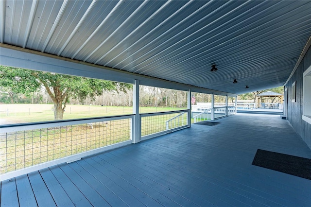 wooden deck featuring a yard