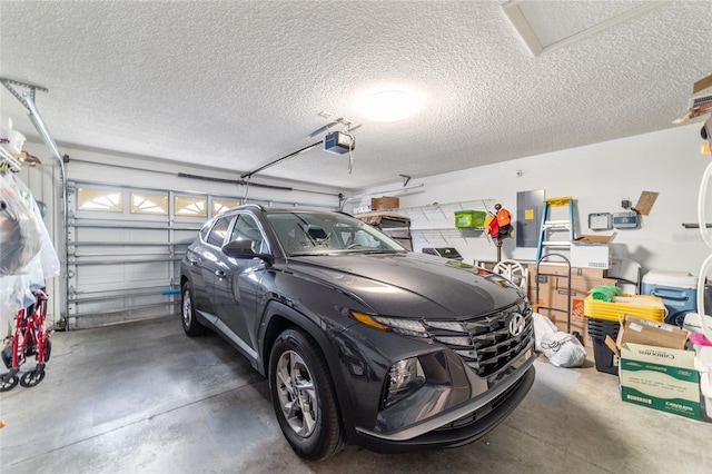 garage featuring a garage door opener and electric panel