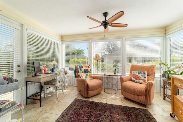 sunroom / solarium with ceiling fan