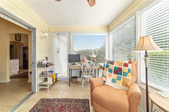 sunroom / solarium with ceiling fan