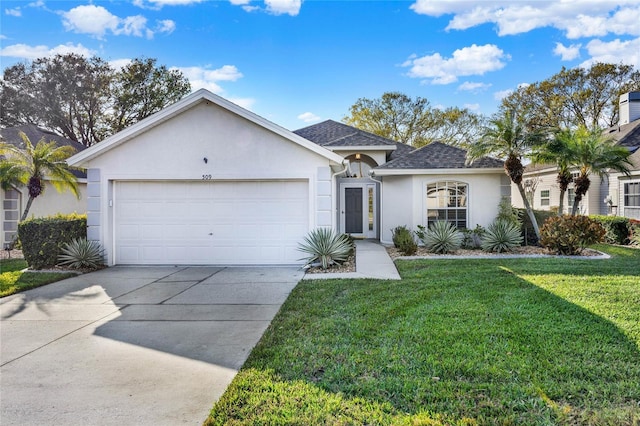 ranch-style house featuring a garage and a front yard