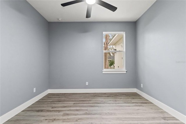 spare room with ceiling fan and light hardwood / wood-style flooring