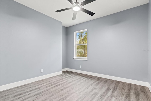 unfurnished room with ceiling fan and light hardwood / wood-style flooring