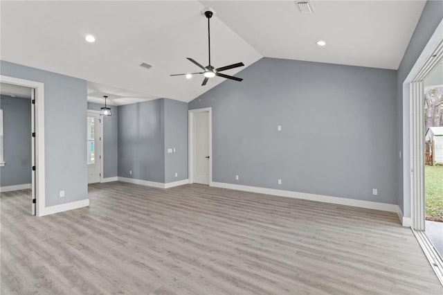 unfurnished living room featuring lofted ceiling, ceiling fan, and light hardwood / wood-style flooring