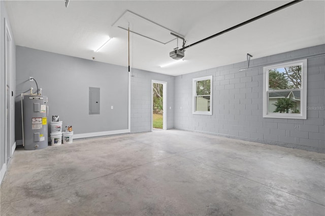 garage with a garage door opener, electric panel, and water heater