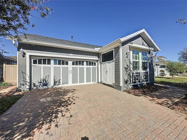 ranch-style home with a garage