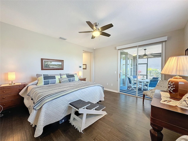 bedroom with ceiling fan, dark wood-type flooring, access to outside, and a textured ceiling