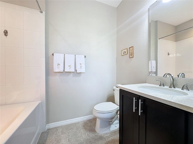 bathroom with toilet and vanity