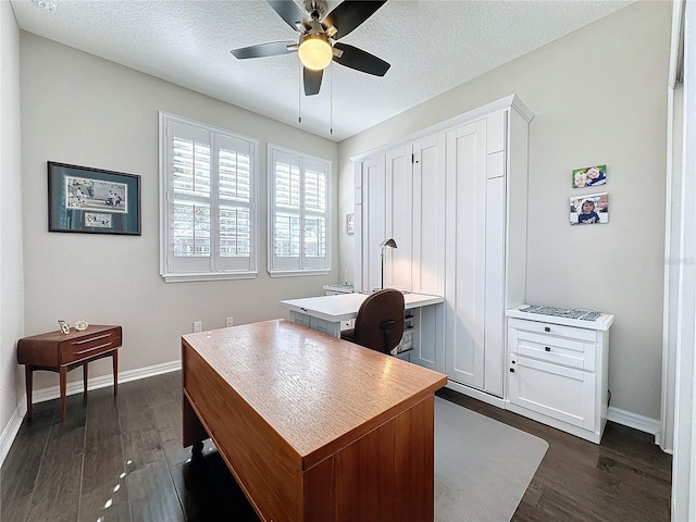 office space with a textured ceiling, dark hardwood / wood-style floors, and ceiling fan